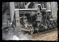 The wheels of the steam locomotive