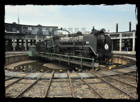 Revolving chassis platform and railroad sidings
